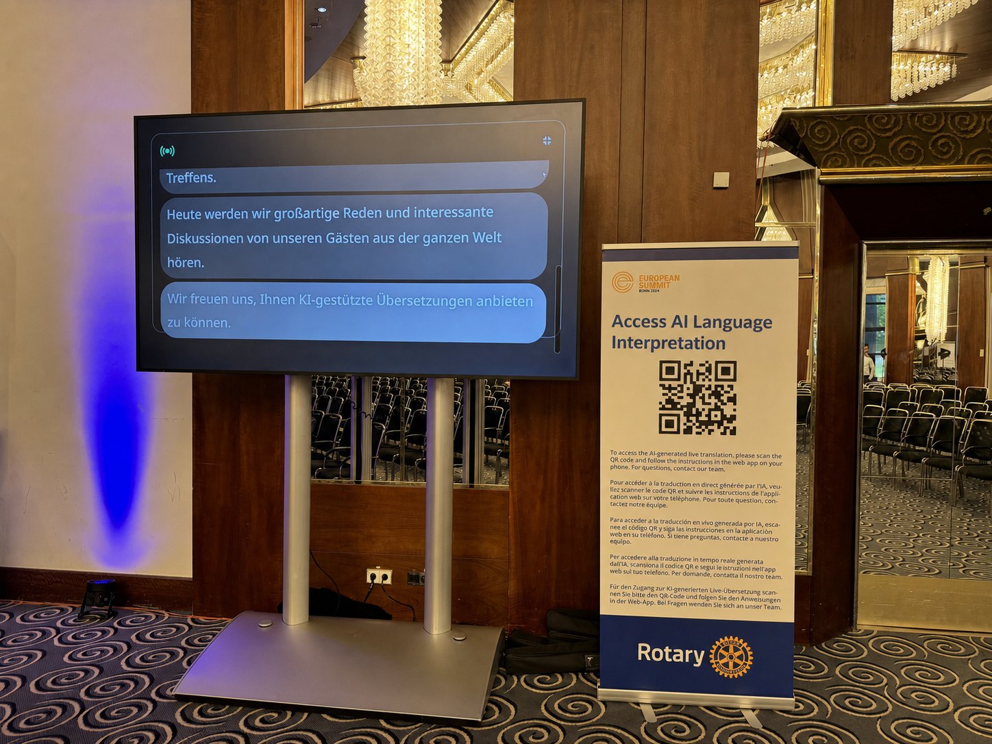 Zugang zur KI-gestützten Live-Übersetzung per QR-Code am Veranstaltungsort